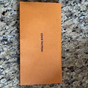 Authentic Louis Vuitton gift envelope.